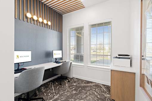 a room with desks and computers