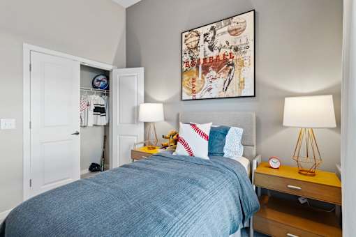 Secondary bedroom featuring contemporary furnishings, ample storage, and comfortable accommodations for residents or guests.