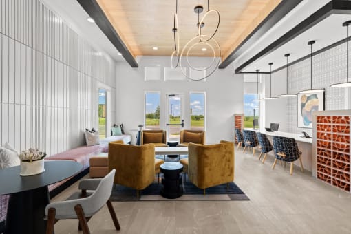 a living room with couches chairs and a table