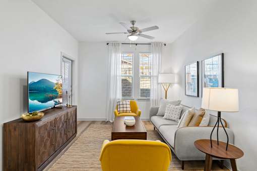 a living room with a couch and a coffee table