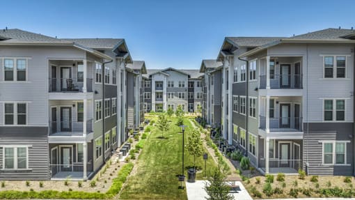 buildings with a grassy area in the middle