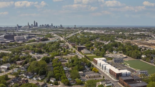an aerial view of property with the city of Cleveland in the background