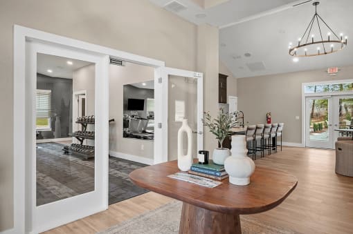 an open living room and dining room with a dining room table