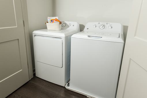 Dedicated laundry space featuring a washer and dryer set, making everyday chores simple and efficient.