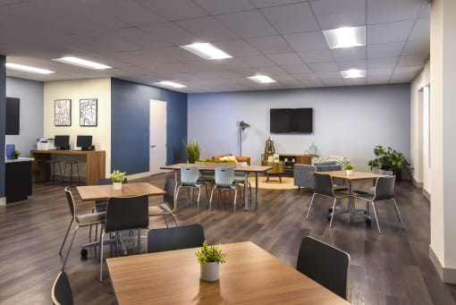 a large room with tables and chairs