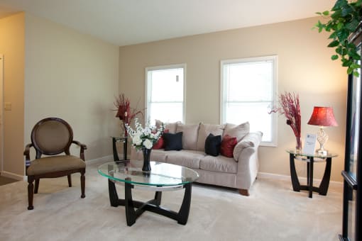 a living room with a couch and a coffee table