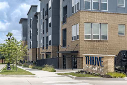A modern apartment complex named Thrive on Crawford.