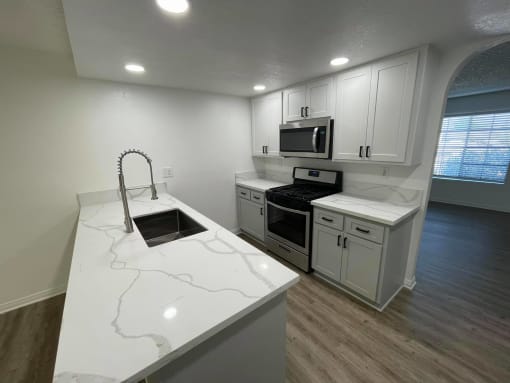 Kitchen at Charter Oaks apartments in Covina, California.