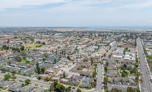 A view of a residential area with houses and roads.