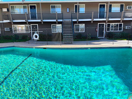 Towne Centre at Orange Apartments with swimming pool.