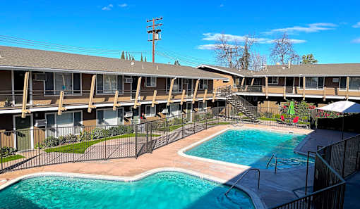 Towne Centre at Orange Apartments with swimming pool.
