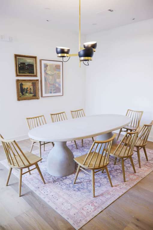 white table surrounded by chairs at Eastover Commons Residential, Jackson, MS 39216  