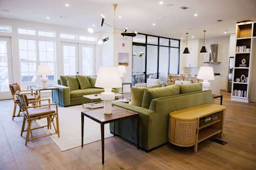 living room with a green couch at Eastover Commons Residential, Jackson, MS  