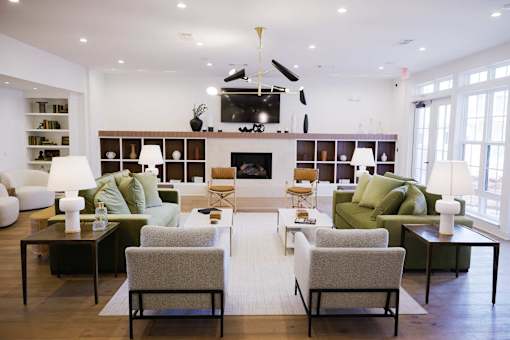 living room with a fireplace at Eastover Commons Residential, Jackson Mississippi