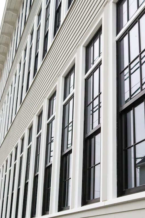 A building with many windows on the side.