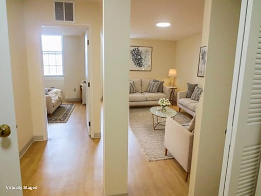A living room with a couch and a coffee table.