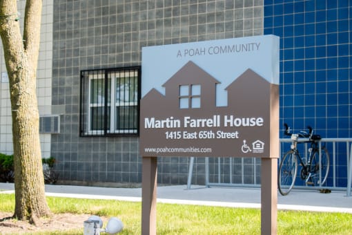 a sign for the marl in front of a building