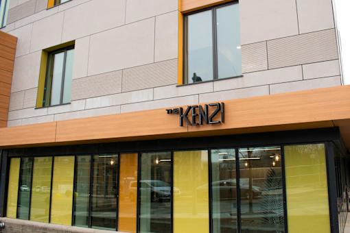 A building with a sign that says "K12" on the front.