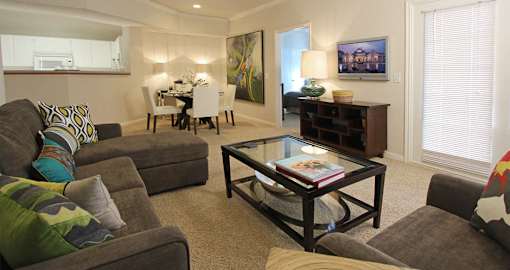 Apartments in southwest Omaha with spacious layout, spacious living room, spacious dining room, and oversized windows at Breckenridge Apartments in southwest Omaha, Nebraska