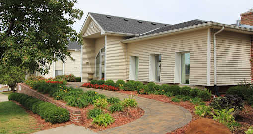 Apartments in central Omaha with lots of trees and lush landscaping, scenic views, and park-like setting at Kensington Woods Apartments