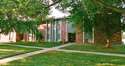 Apartments in La Vista in a park-like setting, scenic views, and lots of trees at The Inverness Apartments