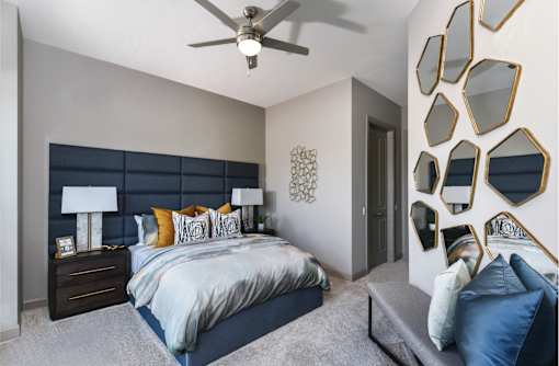 Luxury apartments with master bedroom to fit a king size bed, attached master bathroom and walk-in closet at Xenia Apartments in Golden Valley, Minnesota