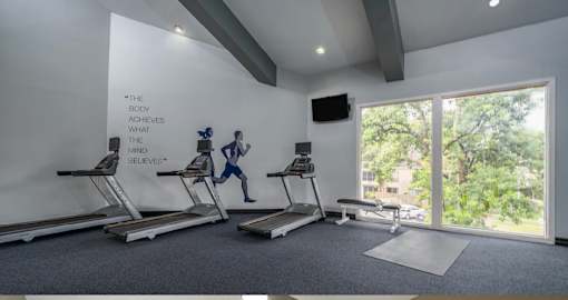 Apartments conveniently located in the Bayou area of Houston with a huge fitness center with separate weights and cardio areas.