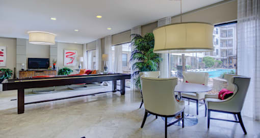 Luxury apartments with resident lounge, resident game room, and resident cyber café at The Voss Apartments in Houston.