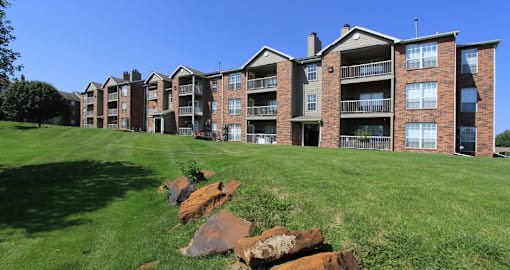 Apartments on 44th and O Street in Lincoln Nebraska with beautiful landscaping, lush landscaping, scenic views, large balconies, spacious balconies, at Tanglewood Apartments