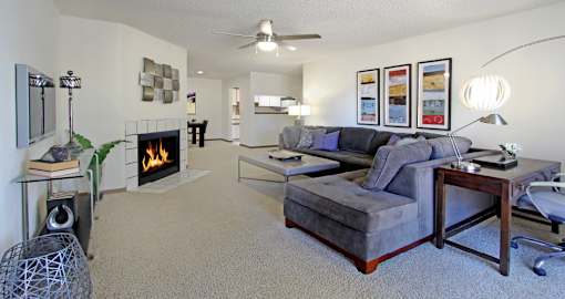 Spacious apartments with woodburning fireplace, huge apartment, spacious living room, and spacious dining room at LionsGate Apartments in Lincoln, Nebraska