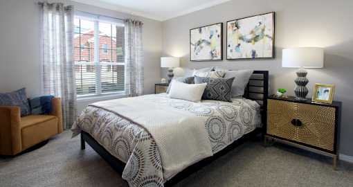Luxury apartments with spacious bedrooms with attached bathrooms and walk-in closets at Rockledge Oaks Apartments in Lincoln, Nebraska