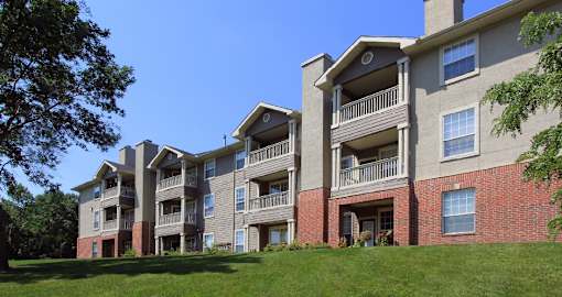 Luxury apartments in southwest Omaha with scenic views of trees and landscaping from patios and balconies