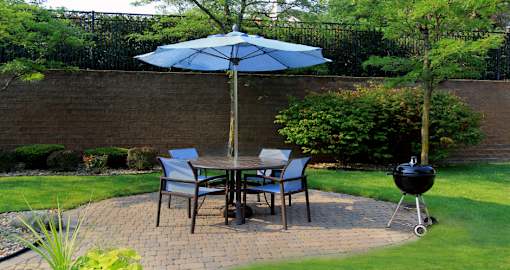 Luxury apartments with lush landscaping, picnic area, grilling station, park-like setting, and scenic views at Lenox Village Apartments in Lincoln, Nebraska