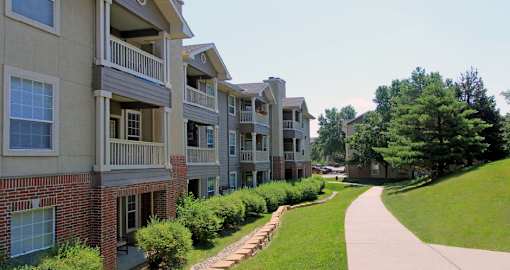 Luxury apartments in southwest Omaha with scenic views of trees and landscaping from patios and balconies