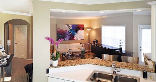 Spacious luxury apartments with 9-foot ceilings, granite breakfast bars, oversized windows and white kitchen cabinets at RidgeGate Apartments in Minnetonka, Minnesota