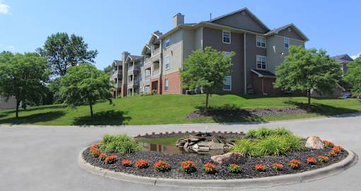 Luxury apartments in southwest Omaha with scenic views of trees and landscaping