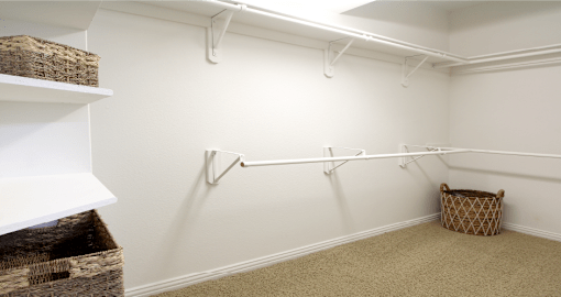 Luxury townhomes with huge master walk-in closet, spacious master walk-in closet at Tuscany Row in Houston.