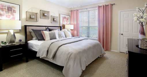 Luxury apartments with spacious bedrooms with attached bathrooms and walk-in closets at TurtleCreek apartments in West Des Moines, Iowa