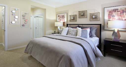 Luxury apartments with spacious bedrooms with attached bathrooms and walk-in closets at TurtleCreek apartments in West Des Moines, Iowa