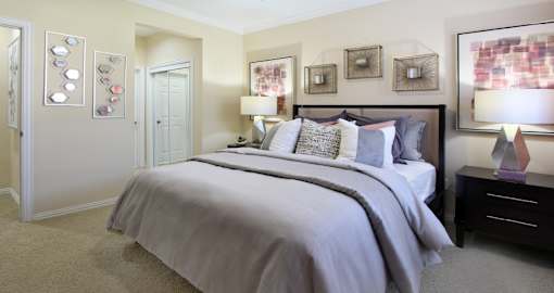 Luxury apartments with spacious bedrooms with attached bathrooms and walk-in closets at Saddlebrook apartments in Urbandale Iowa