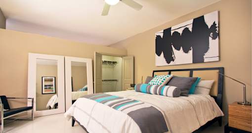 Luxury apartments with spacious bedroom in soft-loft style layout at Villa Piana Apartments in Dallas