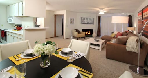 Huge apartment, spacious floor plan, spacious apartment with woodburning fireplace, spacious kitchen, spacious dining room, bright white kitchen at Tanglewood Apartments