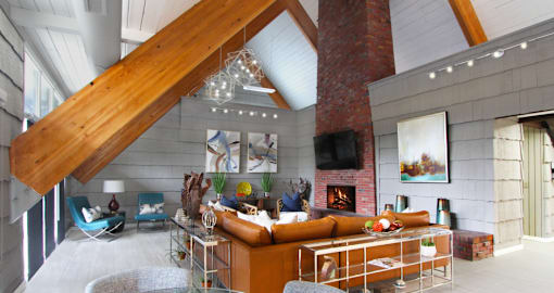 Luxury resident clubhouse with free wi-fi, resident kitchen, resident lounge, and meeting room at Alpine Village Apartments in La Vista, Nebraska