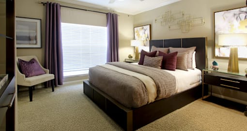 Luxury apartments with spacious bedrooms with attached bathrooms and walk-in closets in north Dallas at Kensington Square Apartments.