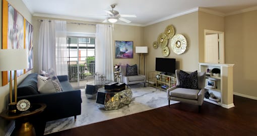 Luxury apartments in North Dallas with spacious floorplans, spacious living room, built-in shelves, 9-foot ceiling, and large balcony at Kensington Square Apartments.