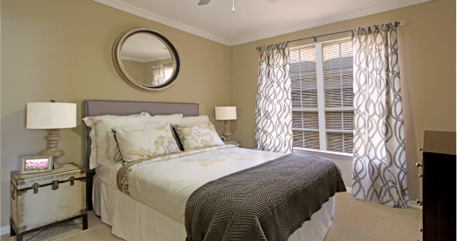 Spacious bedroom with large walk-in closet and 9-foot ceilings at The Biltmore Apartments in Omaha, Nebraska