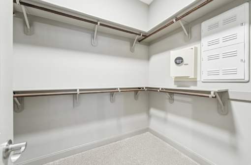 Huge spacious walk-in closet with lock safe at Xenia Apartments in Golden Valley, Minnesota