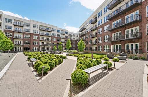 Huge luxury courtyard with lush landscaping at Xenia Apartments in Golden Valley Minnesota