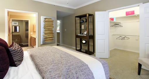Luxury apartments with spacious bedrooms with attached bathrooms and walk-in closets in north Dallas at Kensington Square Apartments.