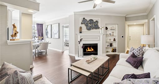 Luxury apartments with wood-burning fireplace, wood plank floors, built-in bookshelves, spacious dining room, and 9-foot ceilings at The Saxony Apartments